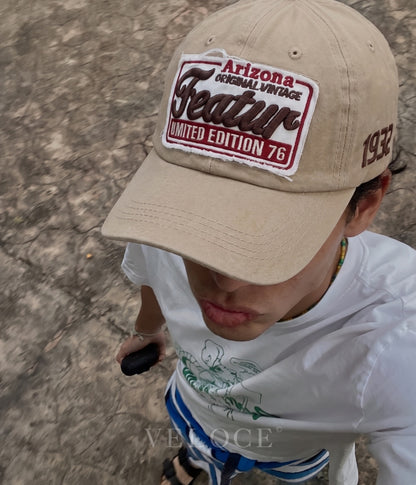 Person wearing the beige Arizona Vintage Patch embroidered cap