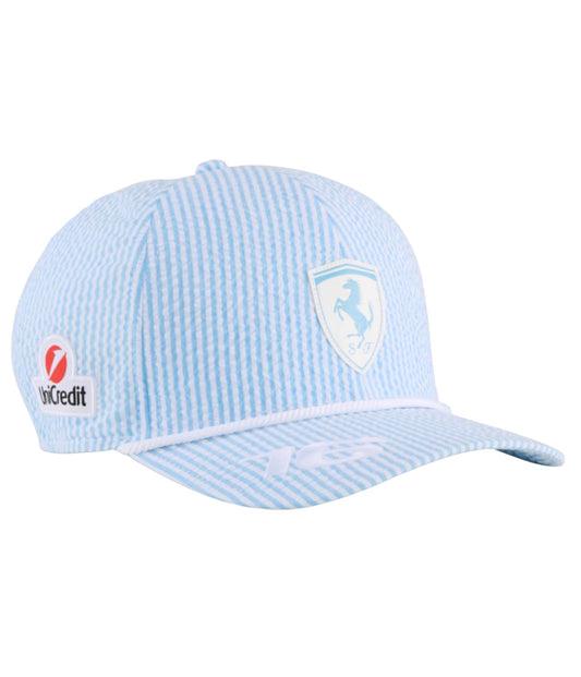 Light blue striped Ferrari F1 2025 seersucker cap at an angle with UniCredit logo and white rope trim
