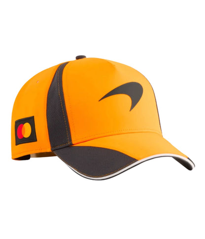 McLaren F1 Team 2025 papaya orange cap, front angle view with Speedmark logo and Mastercard patch