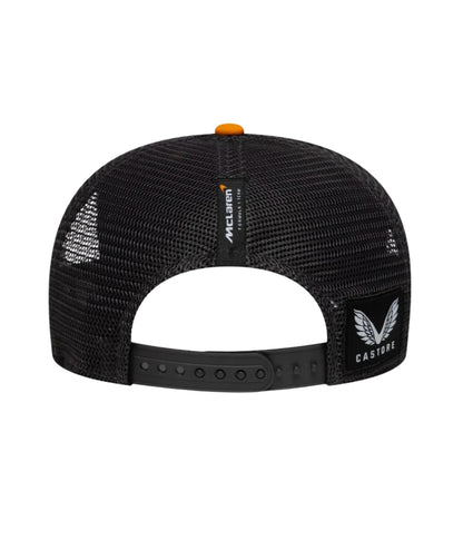 Back of the McLaren F1 Team trucker cap showing black mesh, McLaren F1 Team tab and Castore patch
