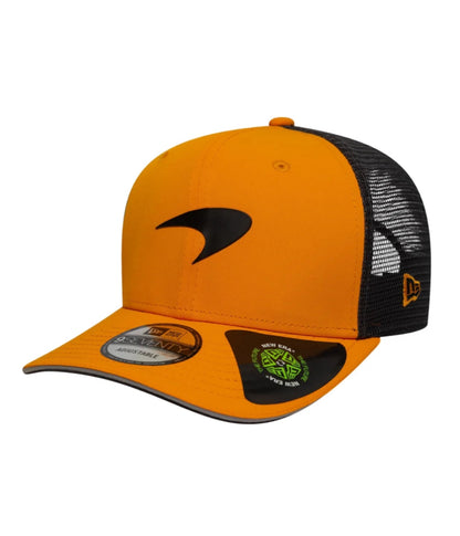 Papaya orange McLaren F1 trucker cap at an angle showing the black mesh panels