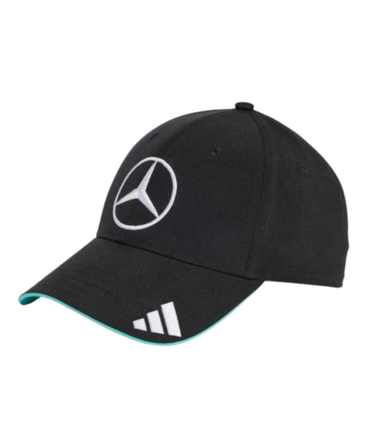 Black Mercedes AMG F1 cap at an angle showing the teal brim trim and adidas logo