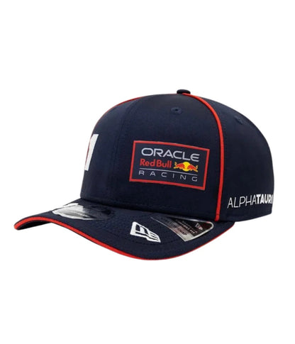 Navy Red Bull F1 Max Verstappen 2023 cap at an angle showing red piping and curved brim
