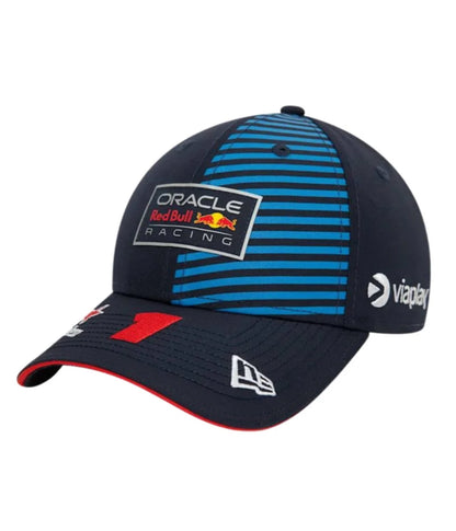 Navy Red Bull F1 2024 cap at an angle showing the light blue striped panel and Oracle Red Bull Racing patch