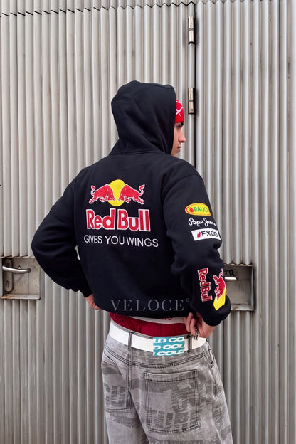 Red Bull Racing F1 hoodie seen from behind in an outdoor setting