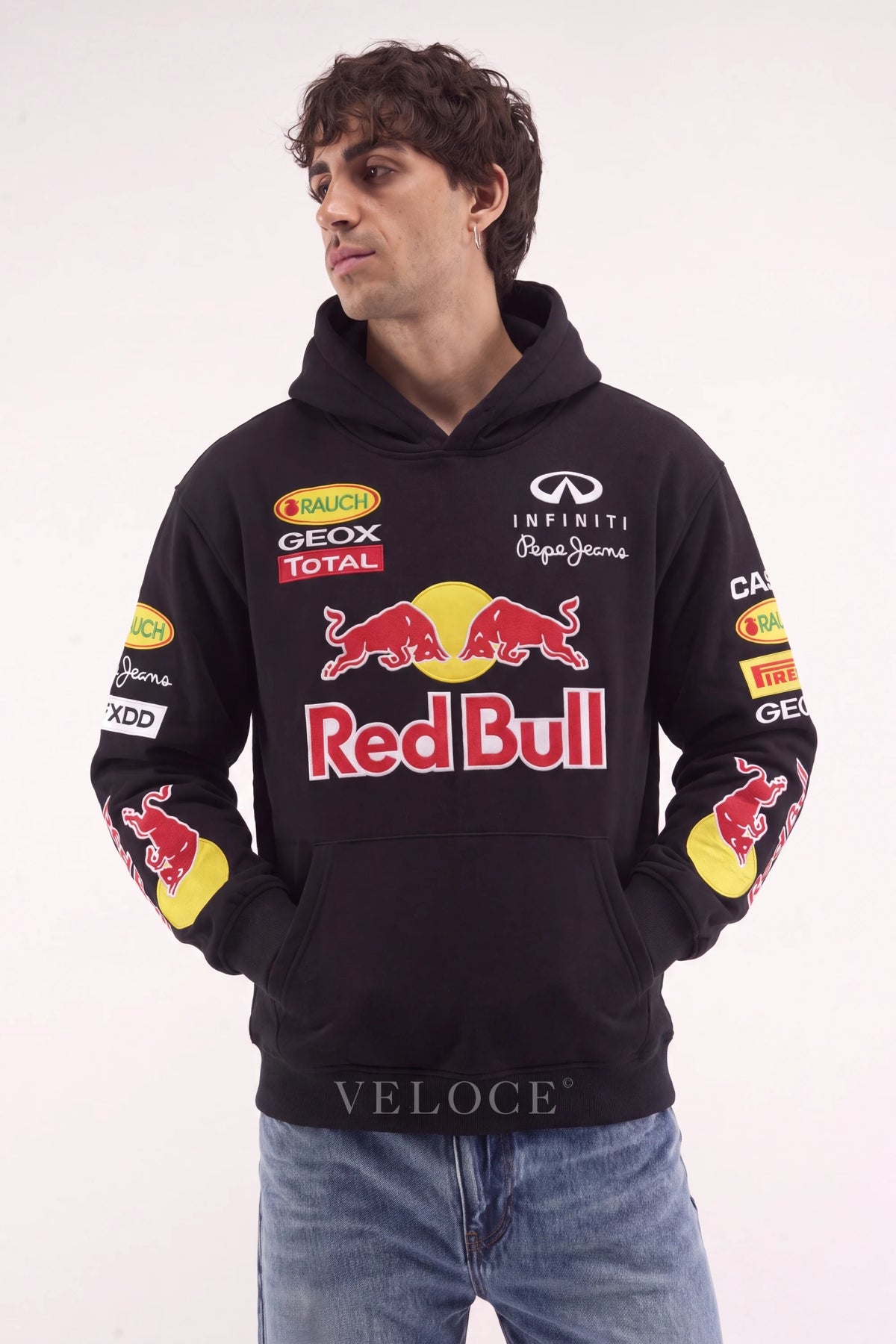 Red Bull Racing F1 hoodie in black worn by a man, embroidered charging bulls on the chest