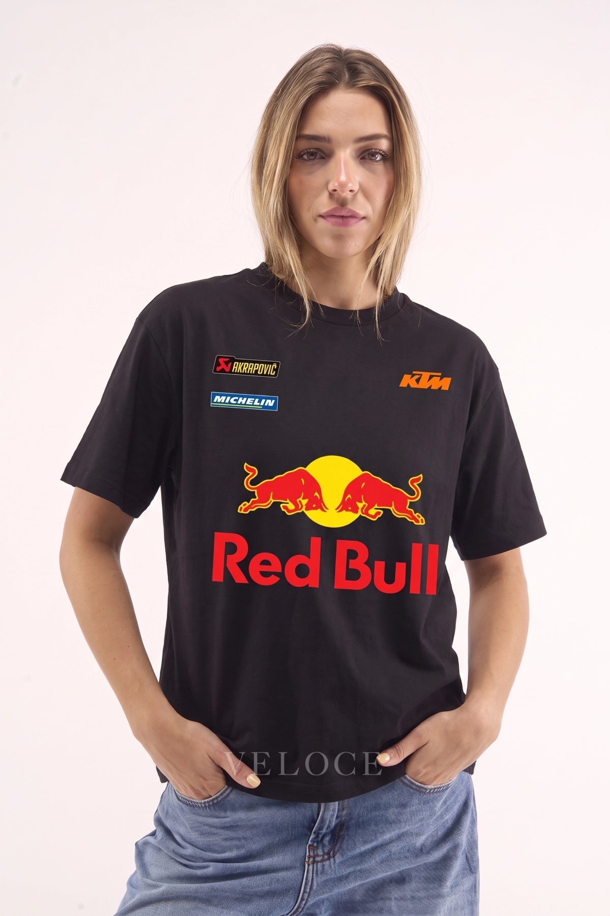 Woman wearing the oversized Red Bull Racing T-Shirt with the classic red and yellow bulls print