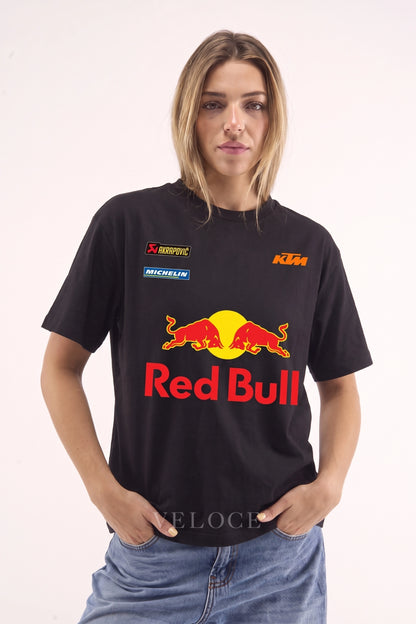 Woman wearing the oversized Red Bull Racing T-Shirt with the classic red and yellow bulls print