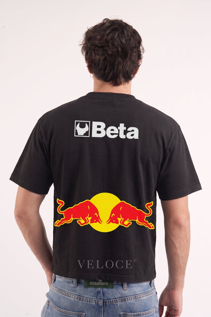 Man wearing the Red Bull Racing T-Shirt from behind, showing the Beta logo and red and yellow bulls print