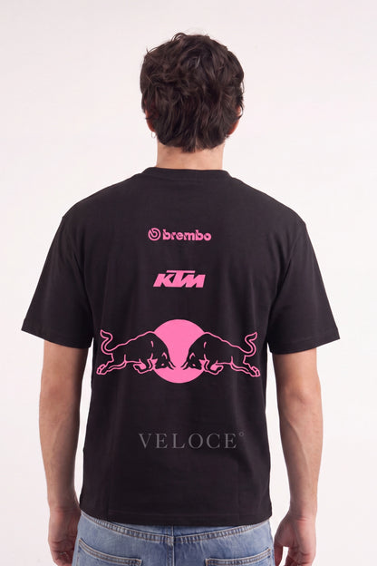 Man wearing the pink Red Bull Racing T-Shirt from behind, showing Brembo, KTM and the bulls print