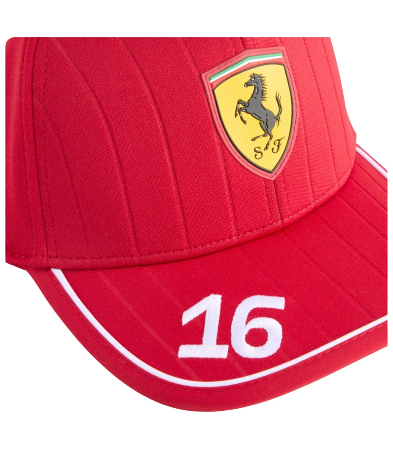 Close-up of the Ferrari shield and embroidered number 16 on the red Scuderia Ferrari F1 cap