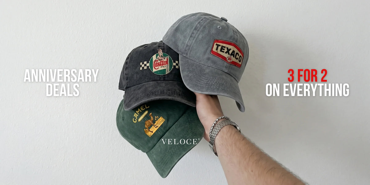 Washed vintage caps held in hand – VELOCE anniversary deals, 3 for 2 on everything